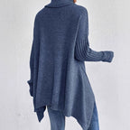 Women's navy oversized cashmere longline jumper with a turtleneck, cosy knitwear.
