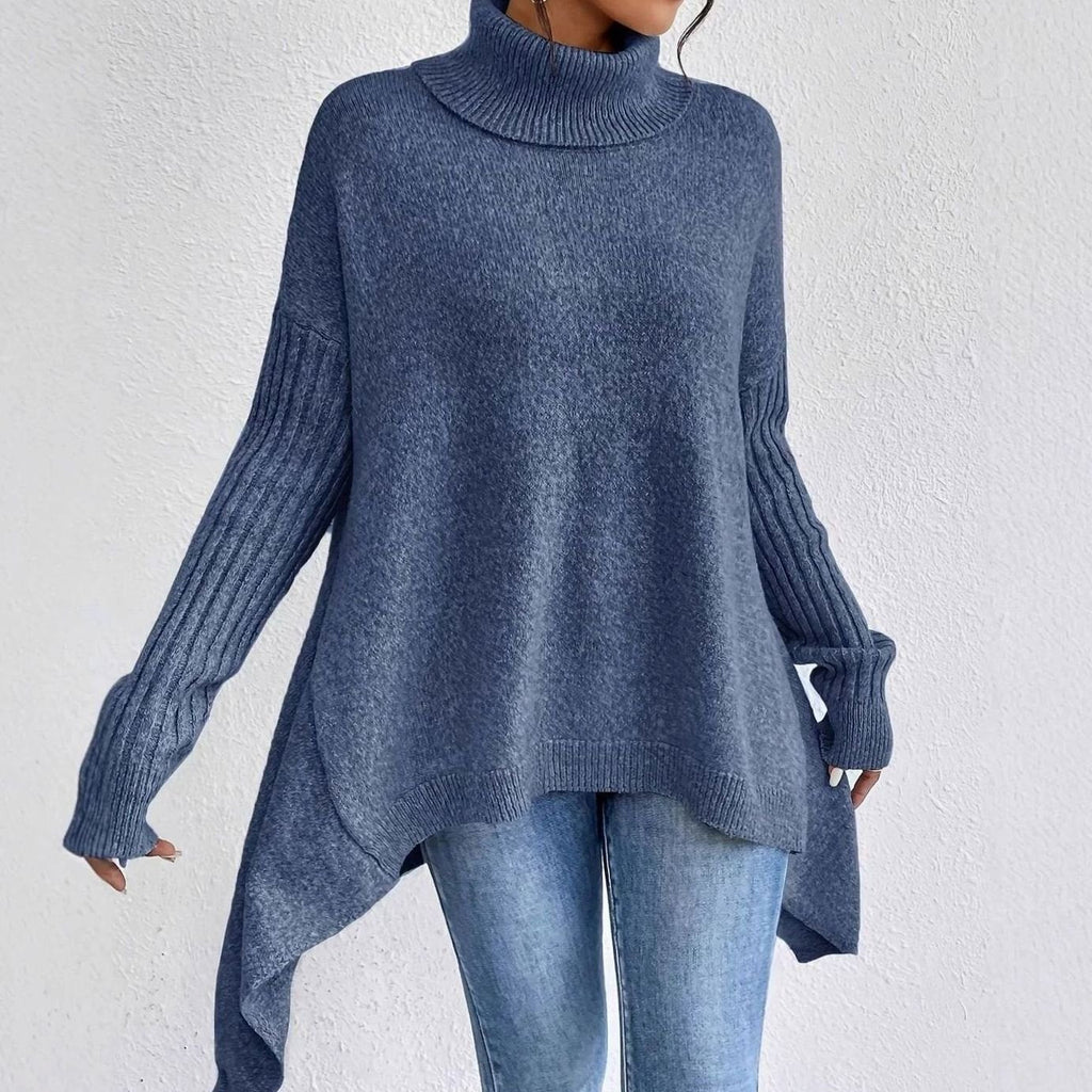 Women's apricot oversized cashmere longline jumper with a turtleneck, cosy knitwear.