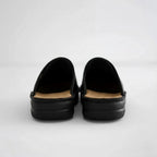 Product photo showing the coffee leather slip-on clogs for easy everyday wear
