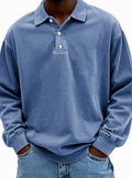 Men's vintage relaxed-fit long sleeve polo shirt in blue with a button placket