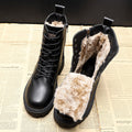 Black Lace-up winter boots for cold wet conditions