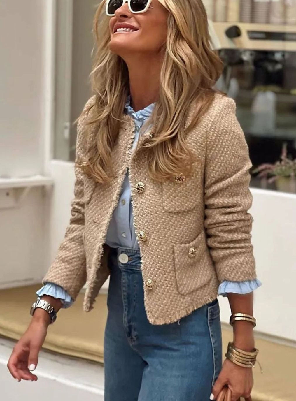 Beige tweed blazer with a tailored cropped fit and gold button-front detailing.