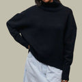 Black oversized roll-neck knit jumper with ribbed cuffs, front view