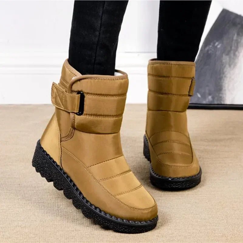 Product photo of the red waterproof quilted winter ankle boots for snow