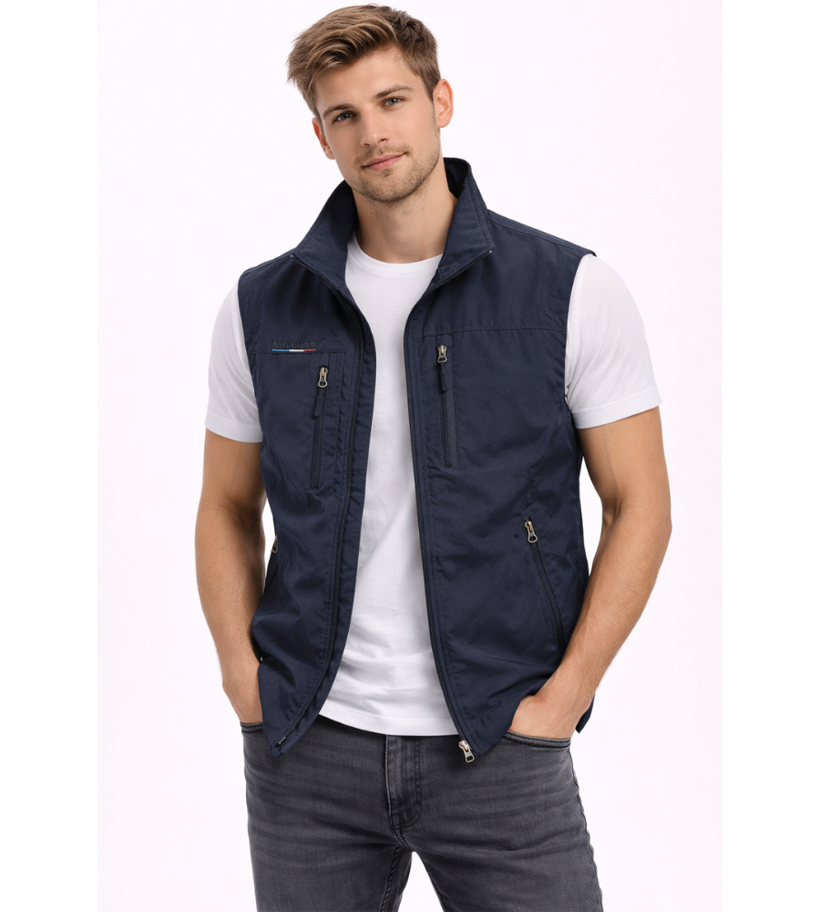 Men's navy blue full-zip sleeveless bodywarmer gilet, lightweight layering piece for autumn.