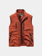 Men's orange breathable cargo gilet with mesh lining for layering