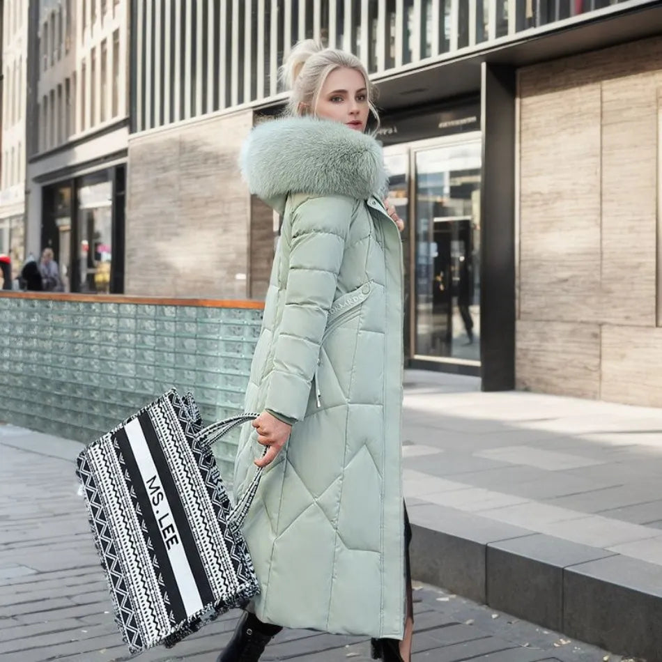 Product photo showing the white hooded puffer coat with trim for cold weather