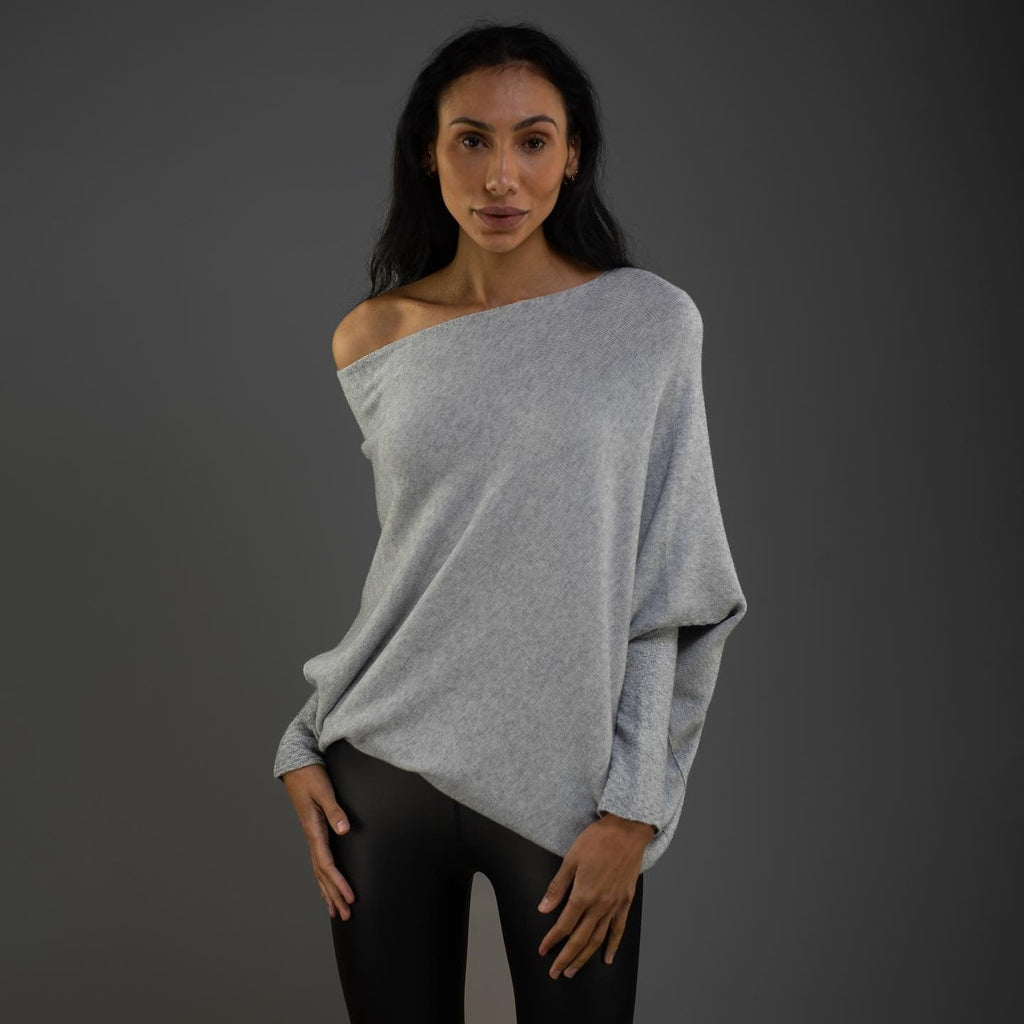 Product photo of the light grey off-shoulder oversized jumper for cosy layering