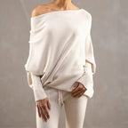 Light Grey Off-shoulder oversized jumper for cosy layering pictured against a plain background