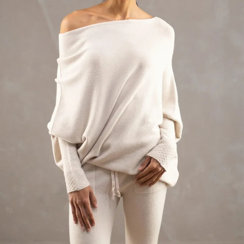 Light Grey Off-shoulder oversized jumper for cosy layering pictured against a plain background