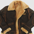 Close-up of the brown aviator jacket's open collar, zip and chest badge detail.