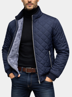 Men's quilted insulated puffer jacket in navy blue with a stand collar