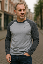 Grey raglan long sleeve cotton t-shirt styled for a casual outdoor look