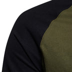 Green raglan long sleeve cotton t-shirt, close-up of the contrast sleeve seam