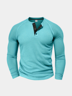 Blue raglan sleeve knit shirt with a half-placket button for men