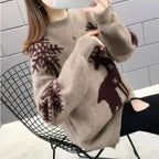 Product photo of the pink winter reindeer pattern christmas jumper