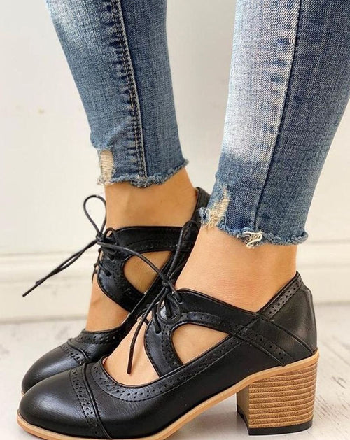 Black vintage lace-up block-heel brogue T-strap shoes, product shot