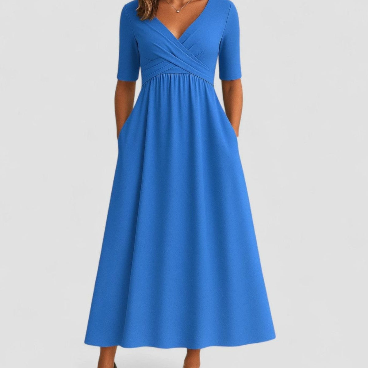 Empire waist midi dress, side profile showing the flared skirt