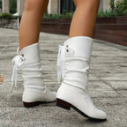 Black Lace-up mid-calf block heel slouchy ankle boots pictured against a plain background