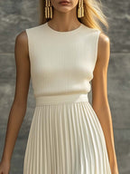 Product photo of the cream sleeveless pleated maxi dress with knit bodice
