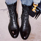 Black Lace-up leather cap-toe ankle boots for autumn, styled product photo