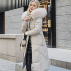 White quilted coat with faux fur hood trim, padded midi-length winter jacket.