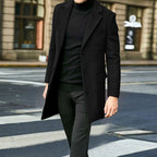 Tailored autumn overcoat for men in a wool-blend fabric with flap pockets.