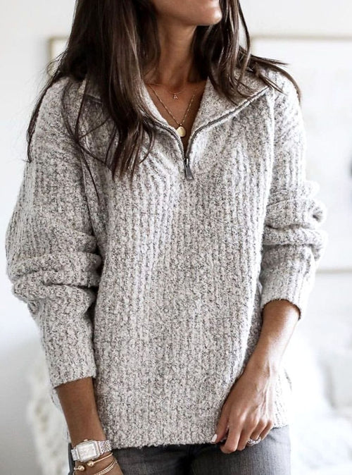 Women's cable-knit zip-up jumper in grey with a ribbed V-neck collar