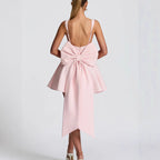 Pink Square-neck flared oversized bow-back mini dress, styled product photo