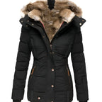 Women's hooded puffer jacket in black with quilted panels and faux fur trim