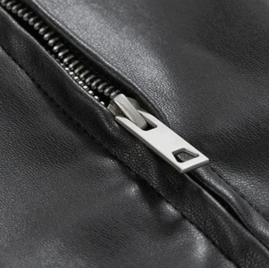 Men's oversized faux leather bomber jacket in black, featuring buttoned cuffs.
