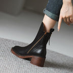 Product photo of the black genuine leather side-zip block heel ankle boots