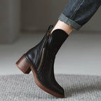 Black Genuine leather side-zip block heel ankle boots shown in a product photo