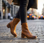 Black Genuine leather side-zip block heel ankle boots pictured against a plain background
