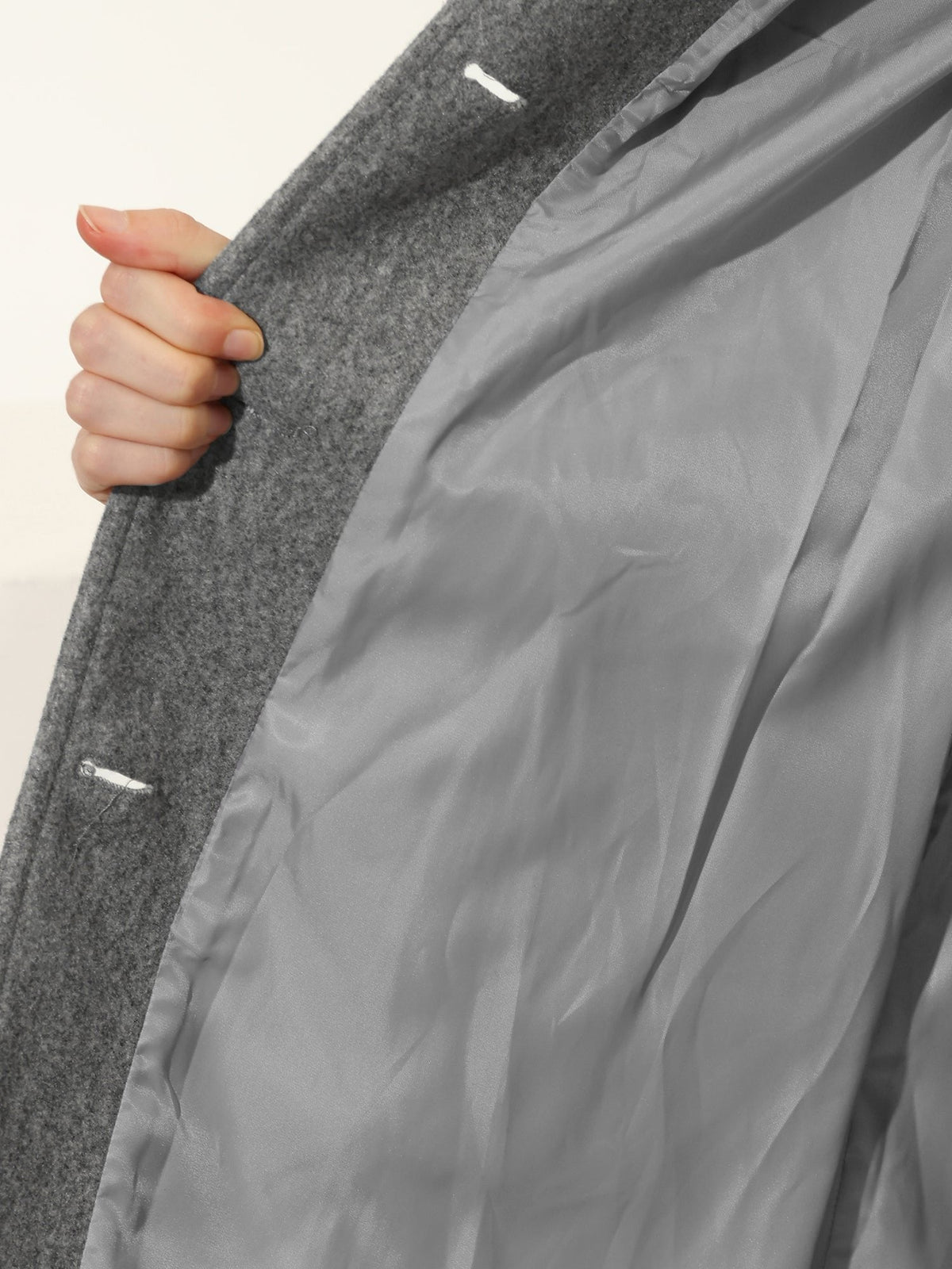 Black Single-breasted structured midi coat for winter, styled product photo