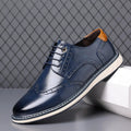 Men's blue brogue oxford shoes with wingtip detailing