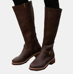 Brown Faux leather buckle knee-high boots for winter, styled product photo