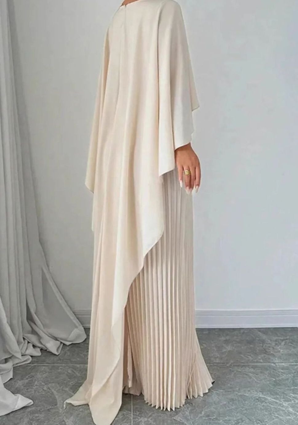 Women's pleated cape-overlay maxi dress in beige with a formal crew neckline