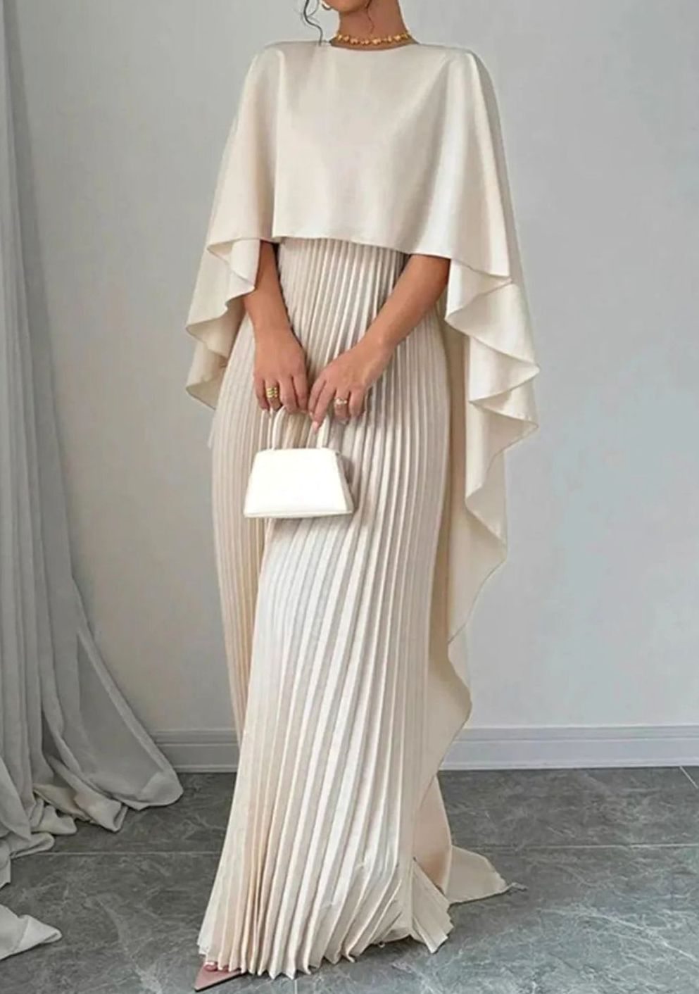 Women's pleated cape-overlay maxi dress in beige with a formal crew neckline