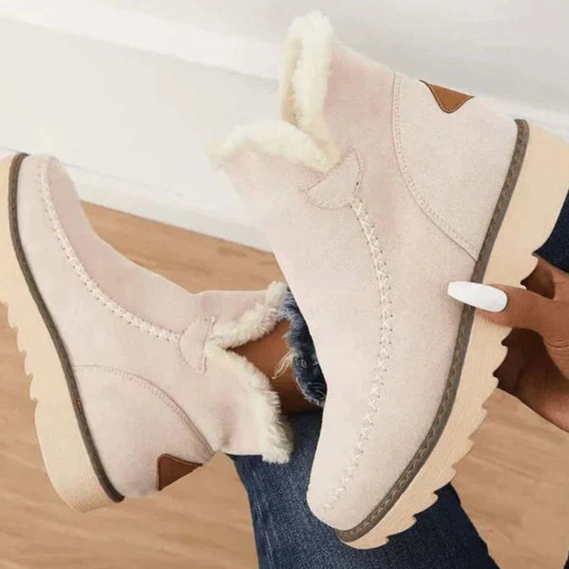 Women's faux fur-lined slip-on ankle boots in beige with a non-slip sole