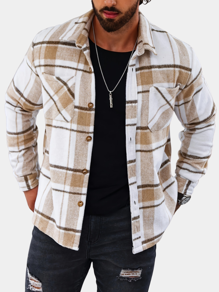 Men's plaid flannel overshirt in khaki, close-up of the chest pockets