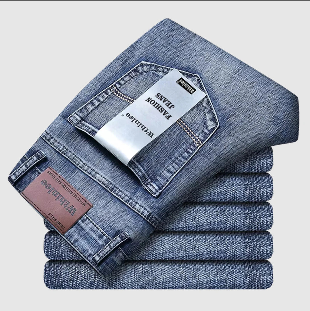 Blue stretch straight-fit jeans for men, folded flat-lay product shot