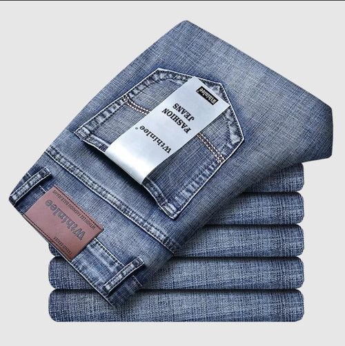Blue stretch straight-fit jeans for men, folded flat-lay product shot