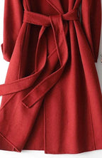 Product photo of the burgundy belted wrap a-line long winter coat for cold days