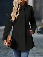 Product photo showing the cream wool blend mid-length stand-collar coat