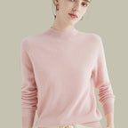 Pink merino wool jumper with mock neck, front view