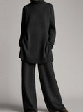 Black turtleneck knit lounge set styled with wide-leg trousers