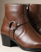 Product photo of the dark brown leather harness-strap pointed-toe ankle boots