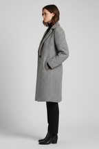 Grey women's blazer-collar coat, back view showing straight hem