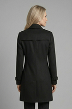 Women's double-breasted longline overcoat in black with strap-cuff sleeves